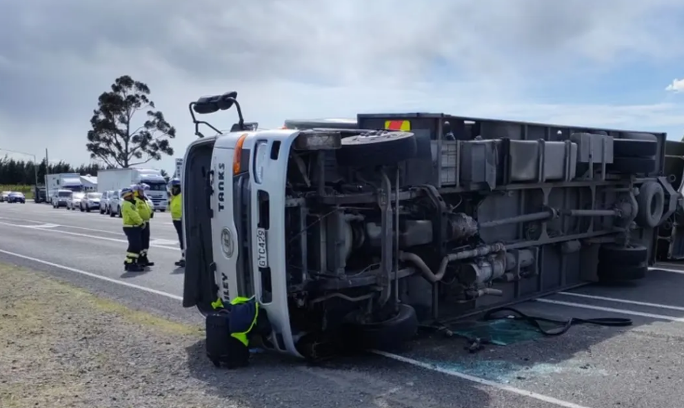 The truck blew over just south of Waipara in Canterbury, blocking all four lanes of SH1 for a...