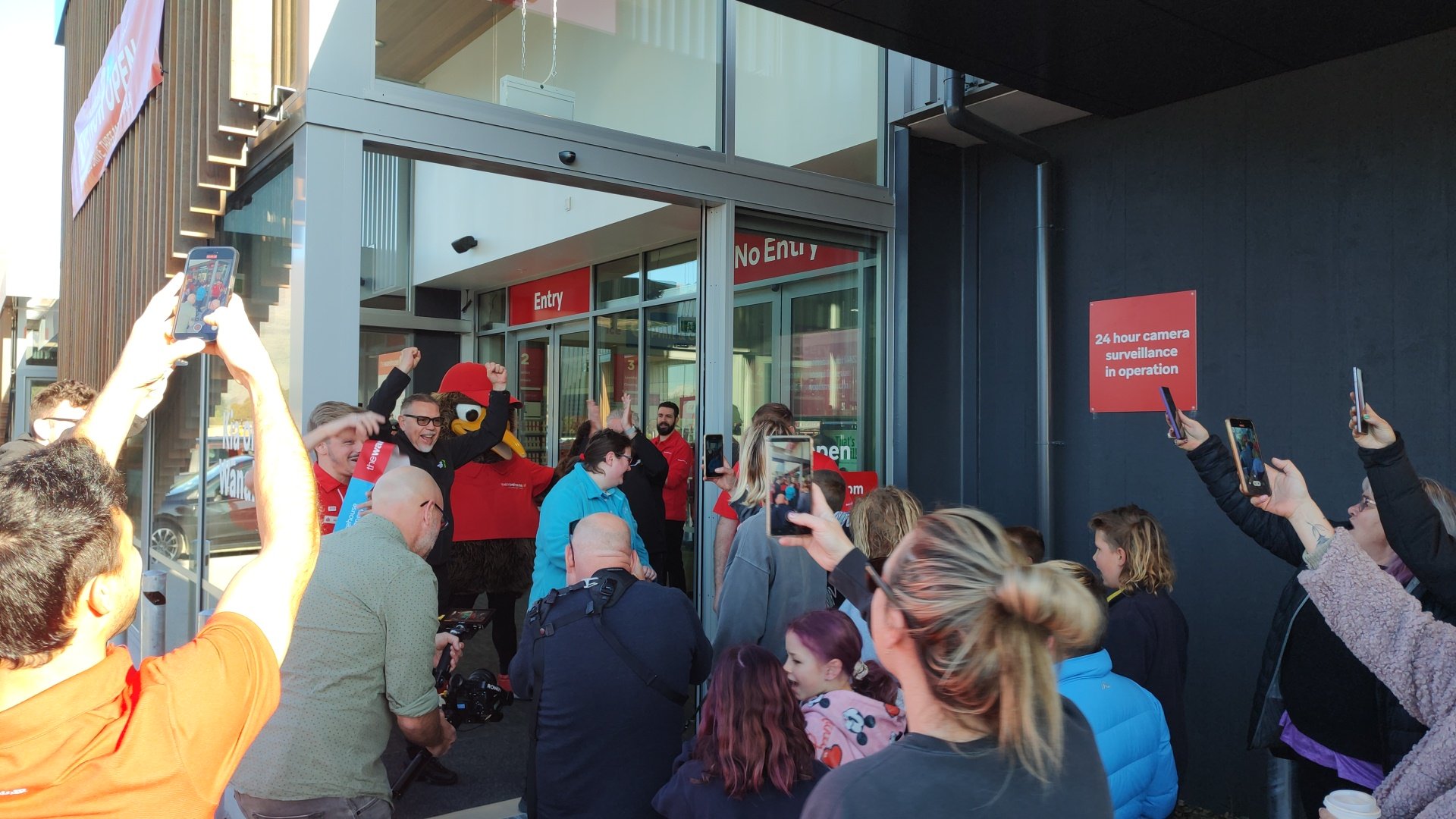 Crowds celebrate the ribbon cutting of Wānaka's first The Warehouse store yesterday. PHOTO: REGAN...