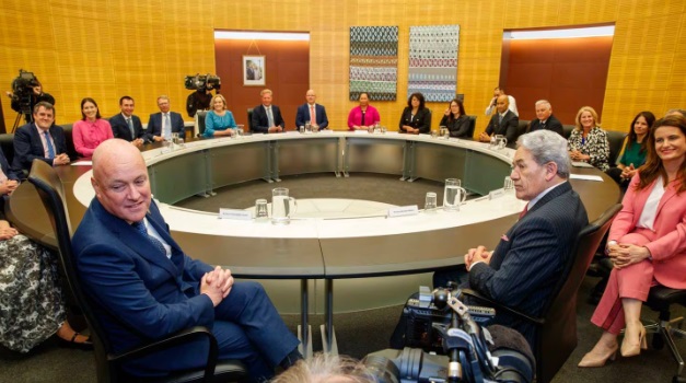 Prime Minister Christopher Luxon (left, front) and Deputy Prime Minister Winston Peters (right, front) before the first Cabinet meeting. Photo: NZ Herald