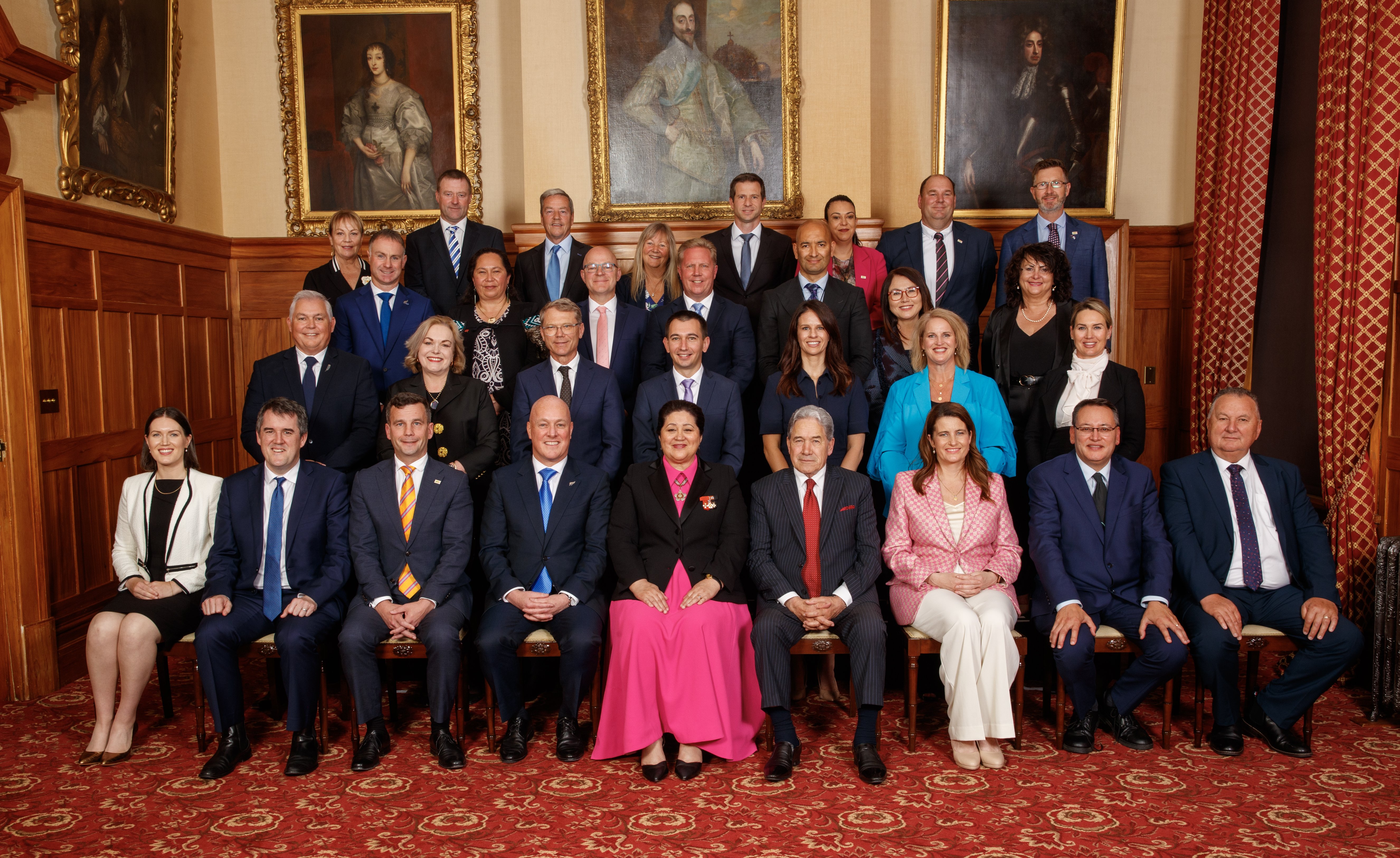 Prime Minister Christopher Luxon (4th left front row), Act leader David Seymour (3rd left front...