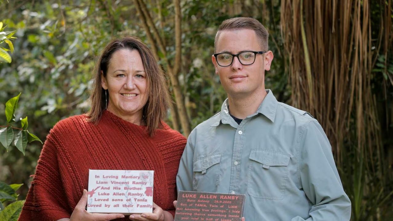 Tania Ranby (left) and Jack Piggott-Newton with the two plaques he made her after the Massey mum...