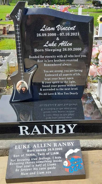 The grave of twin brother Luke and Liam Ranby, showing Luke's original and now missing headstone,...