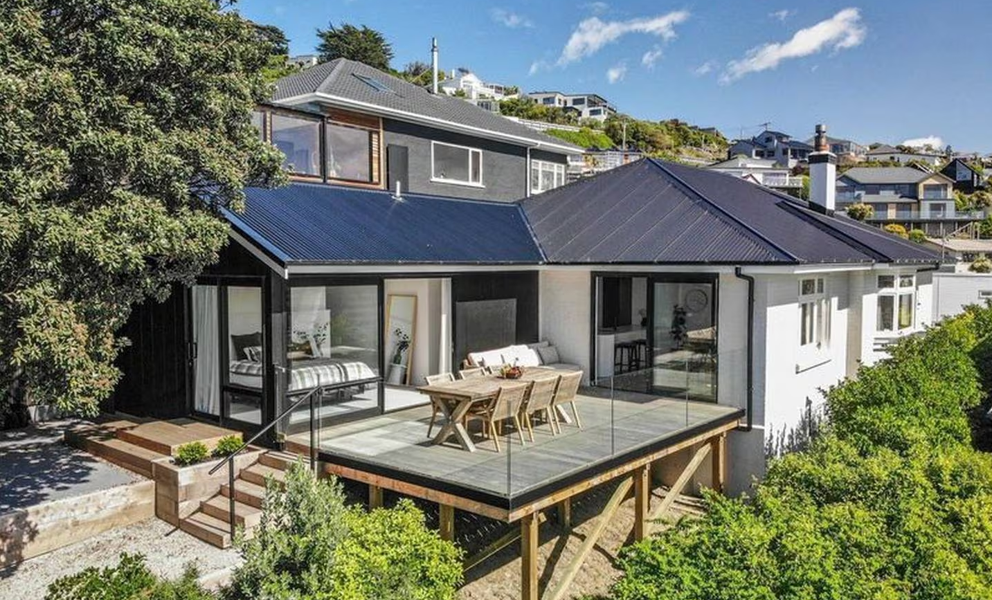 The master bedroom provides similar ocean views. Photo: OneRoof