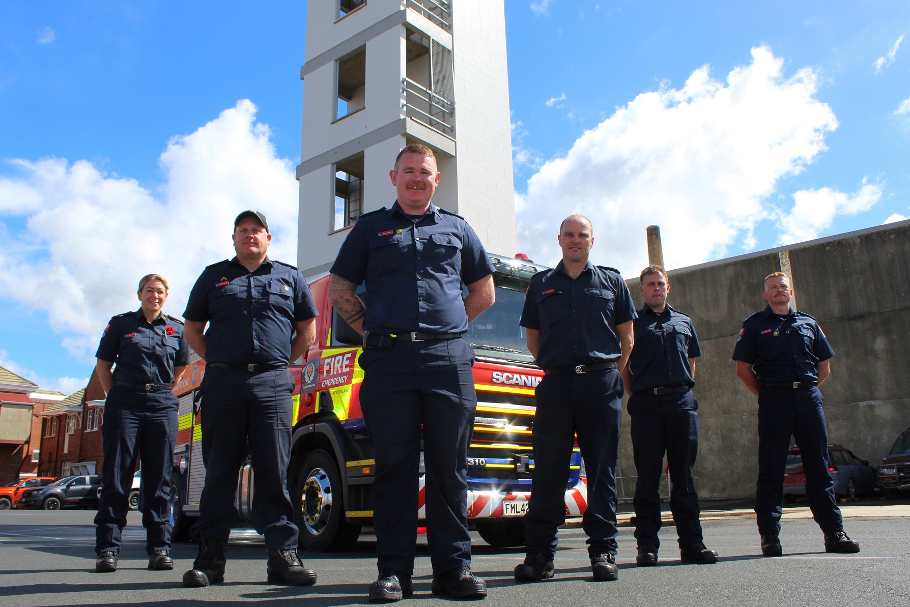 Ready to join forces for a cause are firefighters (from left) Aimee Taylor, Shane Melrose, Mat...