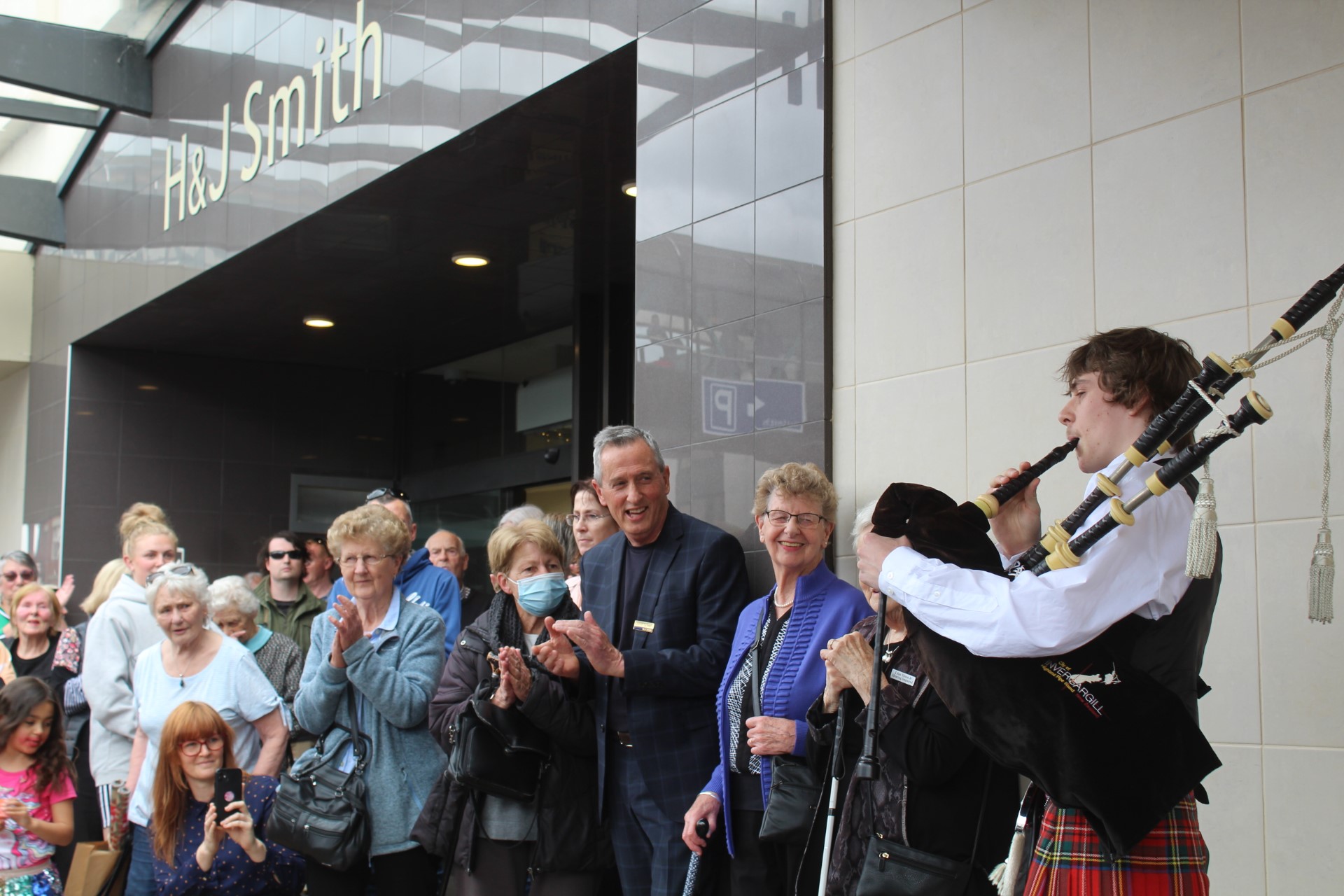 H&J chief executive John Green claps as the bagpipes play for the final closure of the iconic...