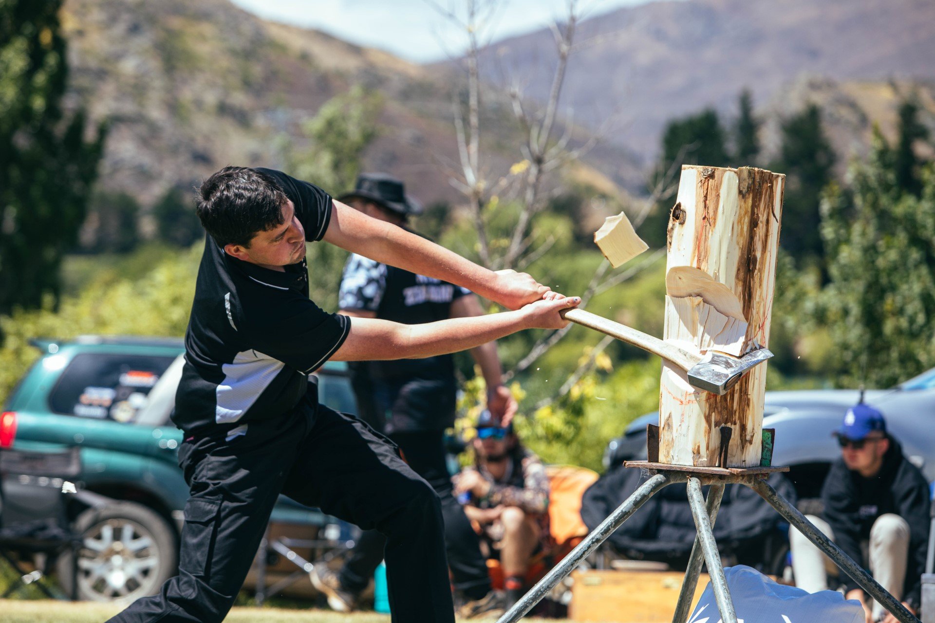 Under-21 New Zealand Team for Timbersports member Sam Unahi competes in the standing chop during...