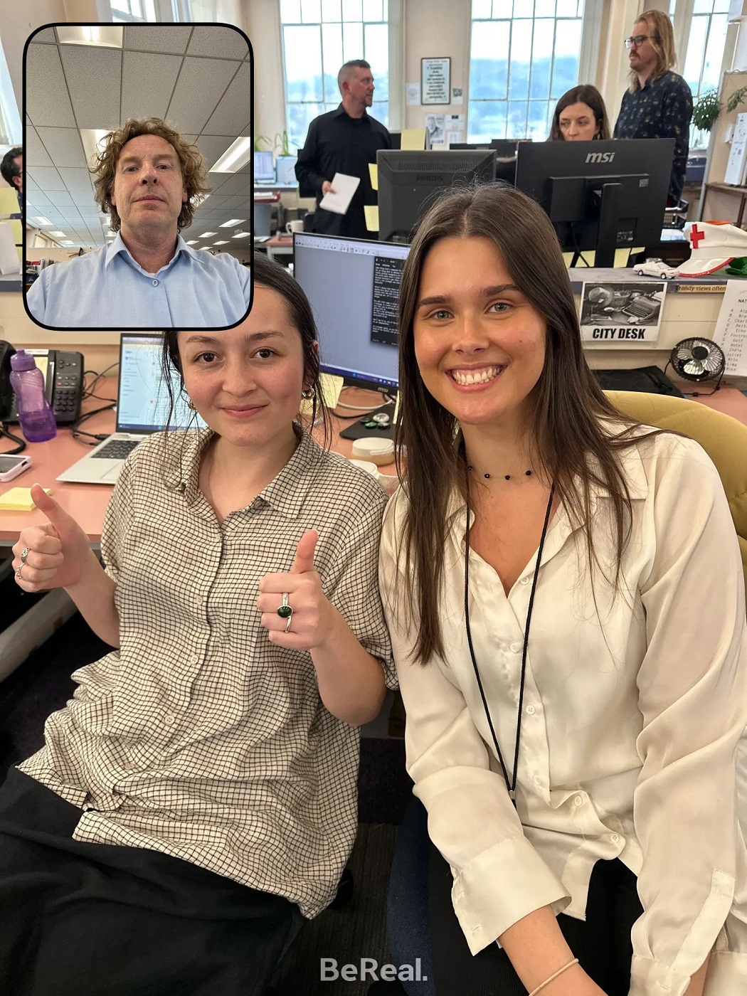 Reporters Ani Ngawhika (left) and Laine Priestley pose for a BeReal taken by online editor Sean...