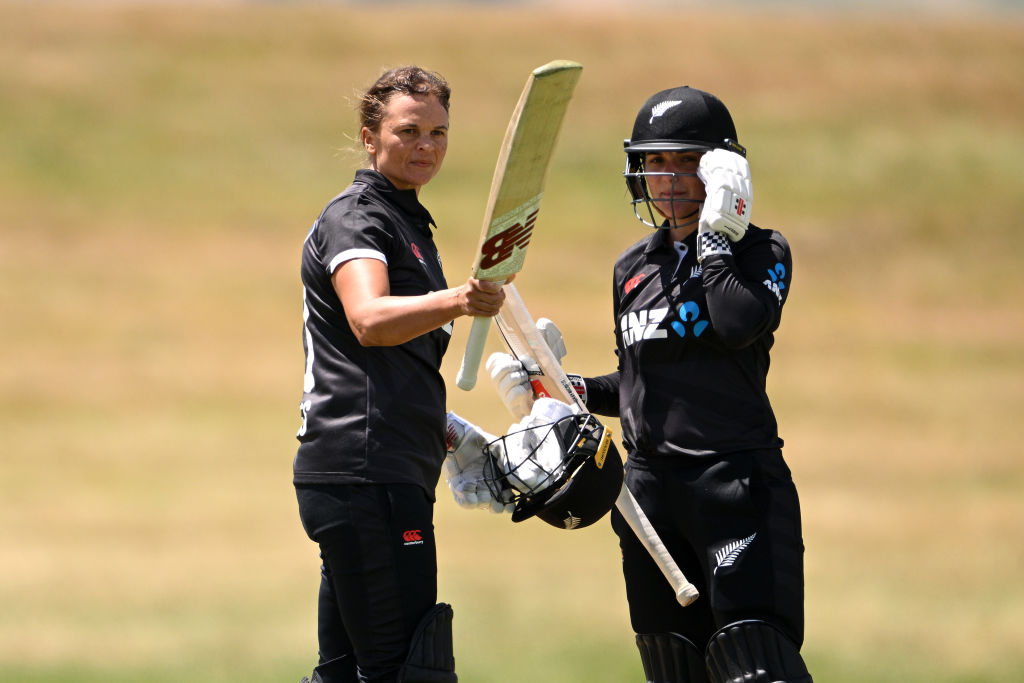 New Zealand's Suzie Bates raises her bat after reaching her century against Pakistan. Photo: Getty