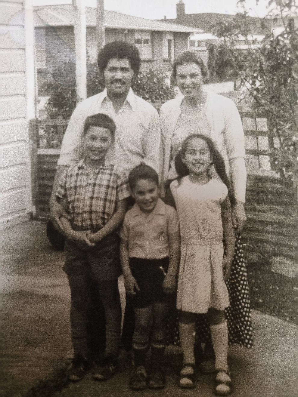 Marama T-Pole with her dad, mum, older brother Telagi and younger brother Tuvalu at their home in...