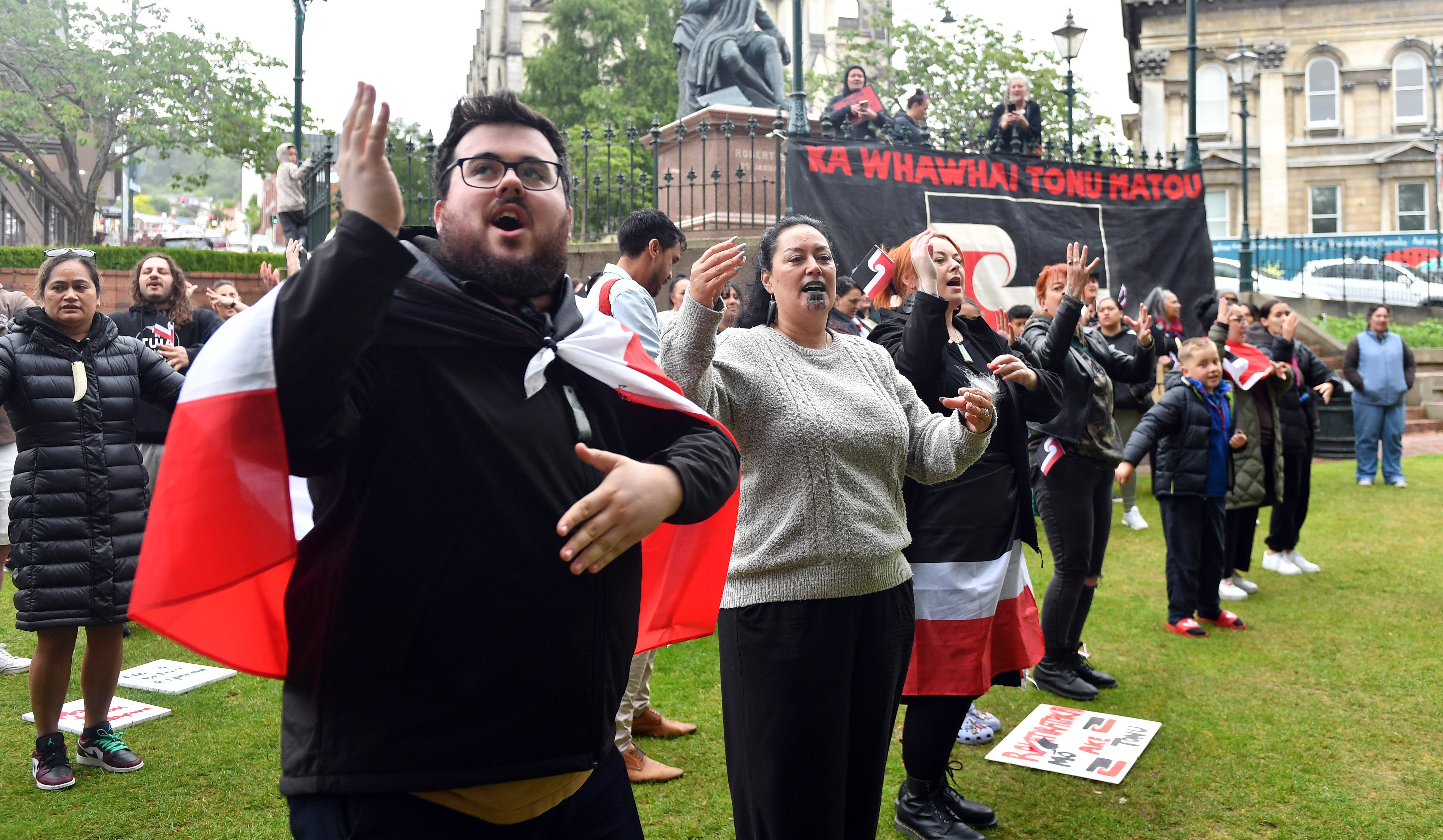 About 80 Dunedin residents gathered in the Octagon yesterday for a peaceful display of solidarity...