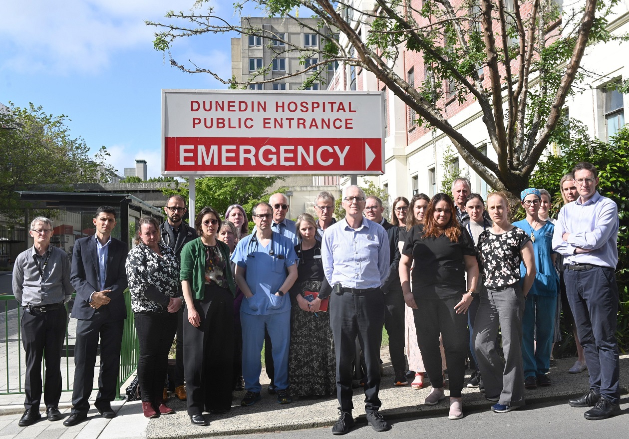 Lung cancer specialist Dr Blair McLaren (centre) is joined outside Dunedin Hospital yesterday by...