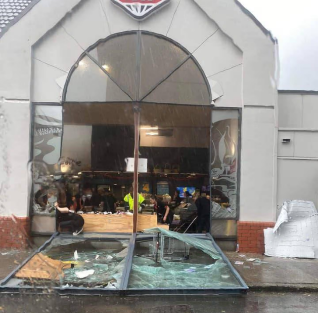 Damage to a Lower Hutt New World as severe weather hits the lower North Island. Photo / Facebook ...