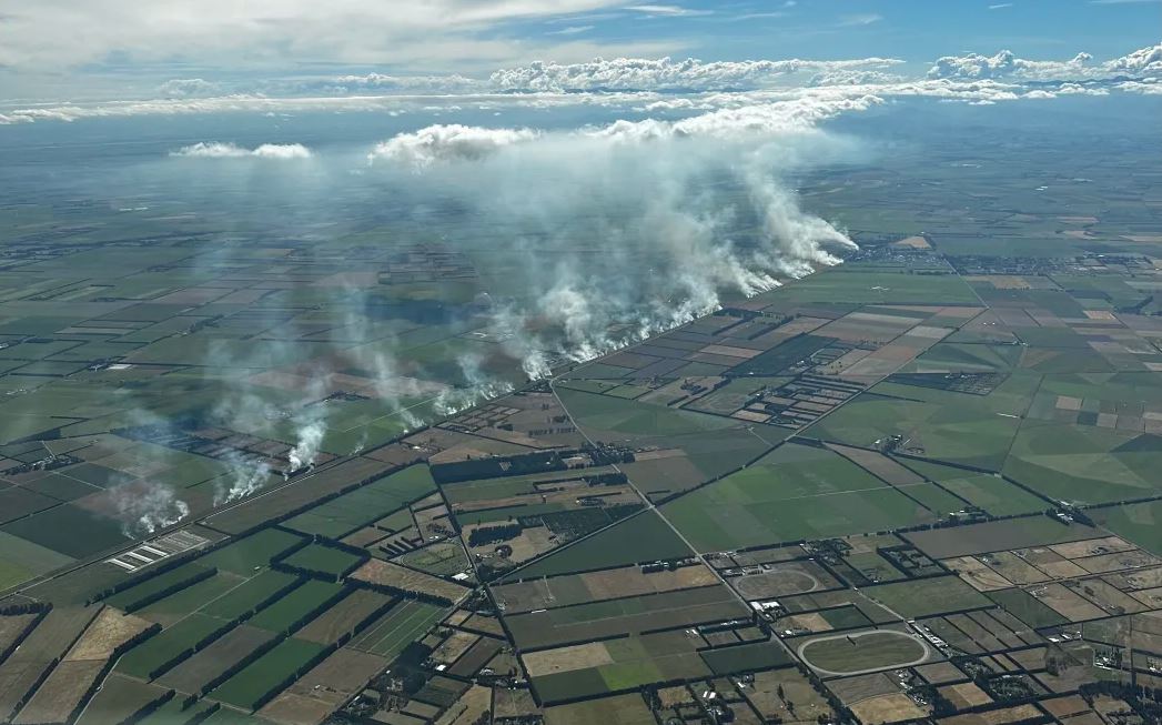 An aerial photo taken about 4.30pm Sunday as fires flared up along a Canterbury rail line. Photo:...