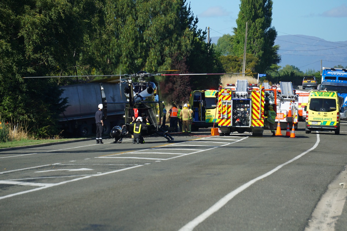 Emergency services at the crash scene on Monday. Photo: Wyatt Ryder