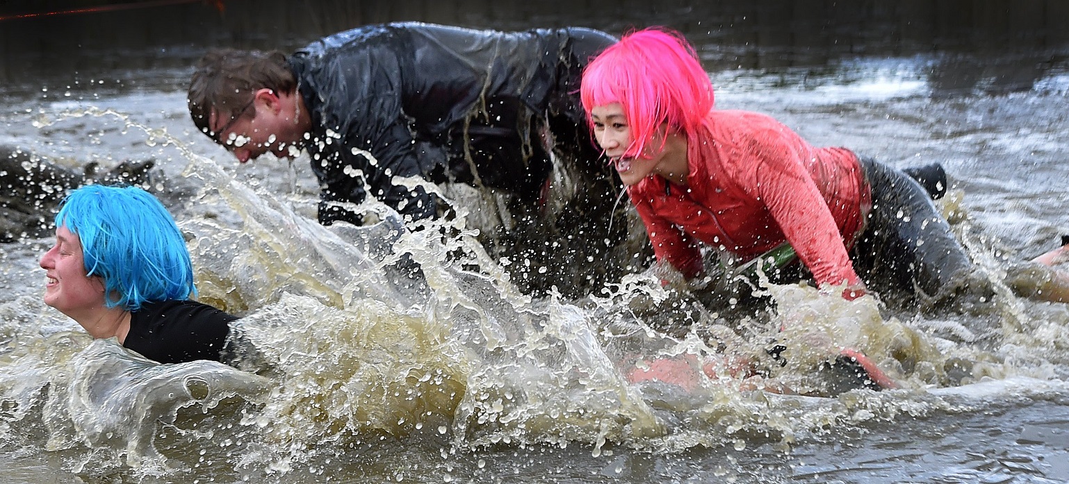 Fast shutter speed and camera ready, I turned around to capture these competitors jumping into...