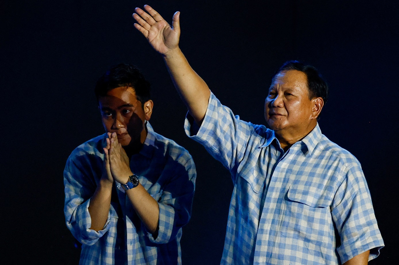 Prabowo Subianto gestures to his supporters as he claims victory in the general election during...