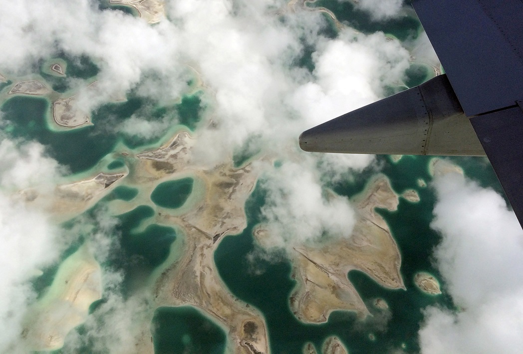 Lagoons can be seen from a plane as it flies above Kiritimati Island, part of the nation of Kiribati. File photo: Reuters