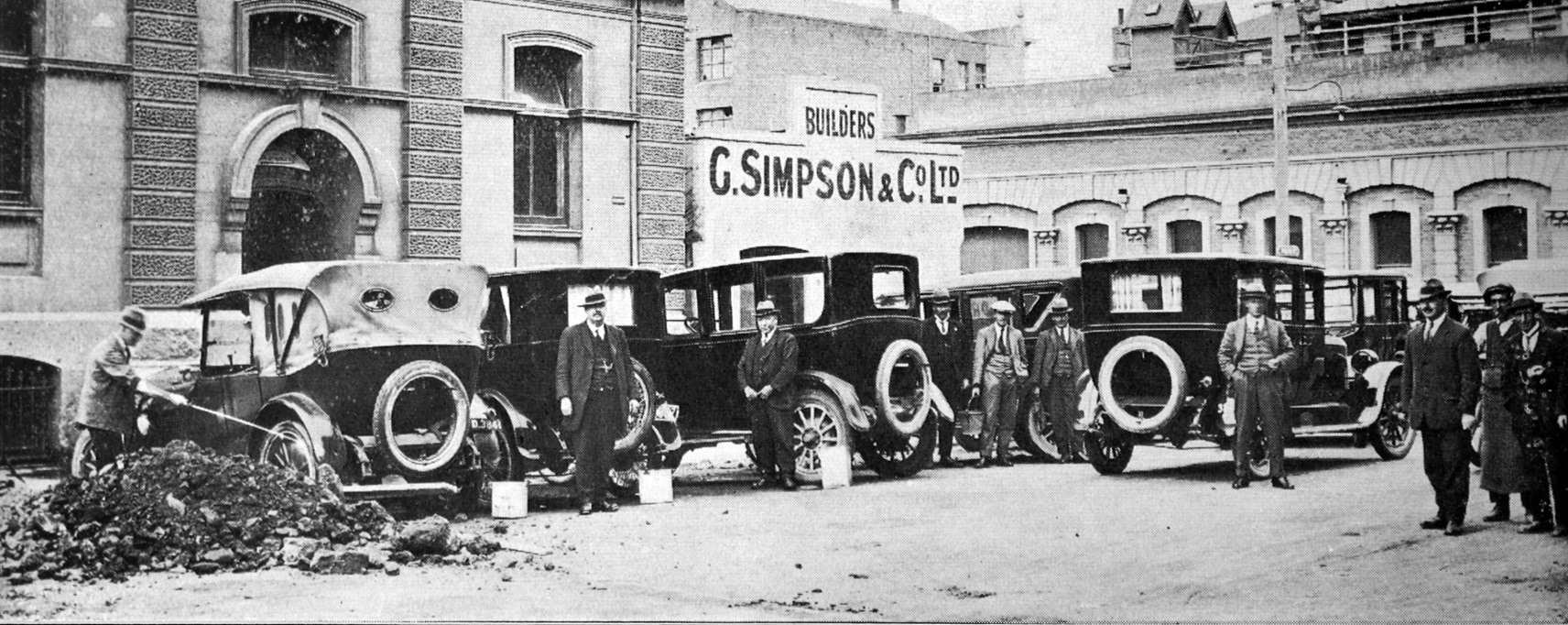 Motor vehicles await their turn to be hosed with bore water at Thomson’s factory in Dunedin,...