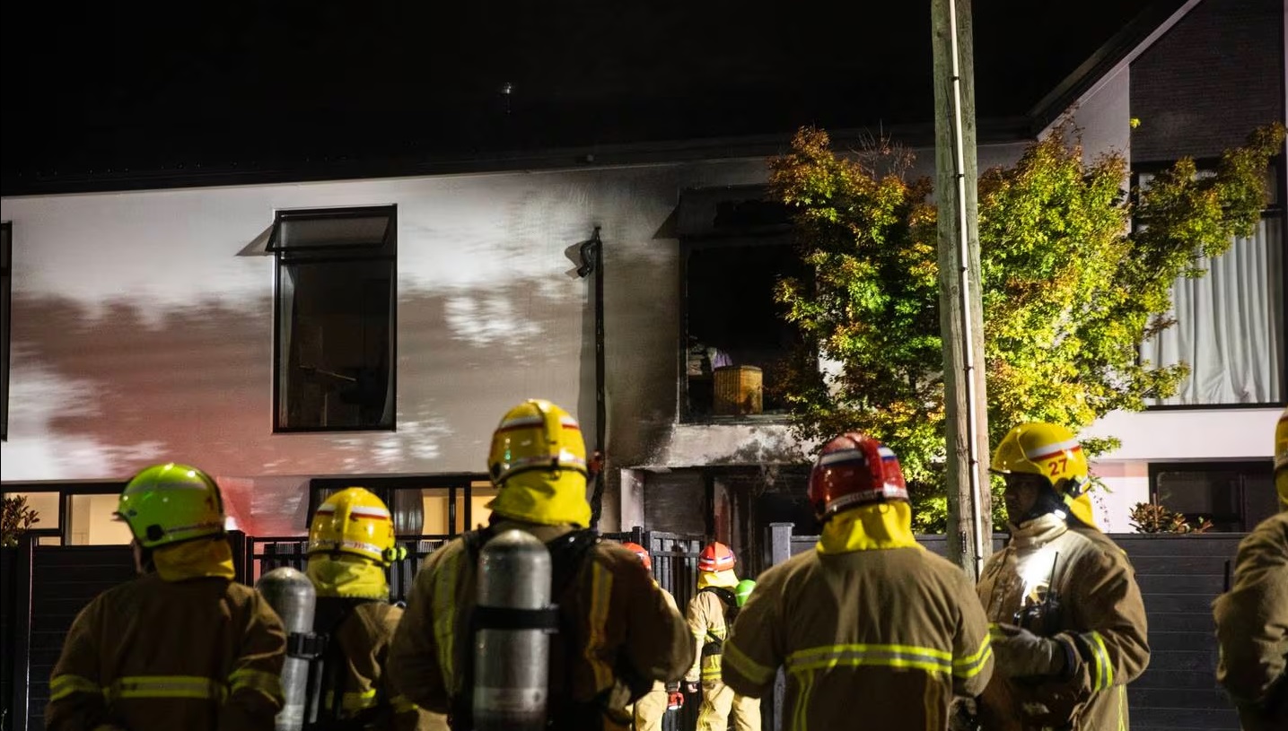 Firefighters at the scene in Christchurch last night. Photos: NZ Herald