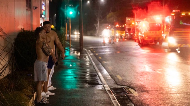 Half-dressed residents escaped the blaze.