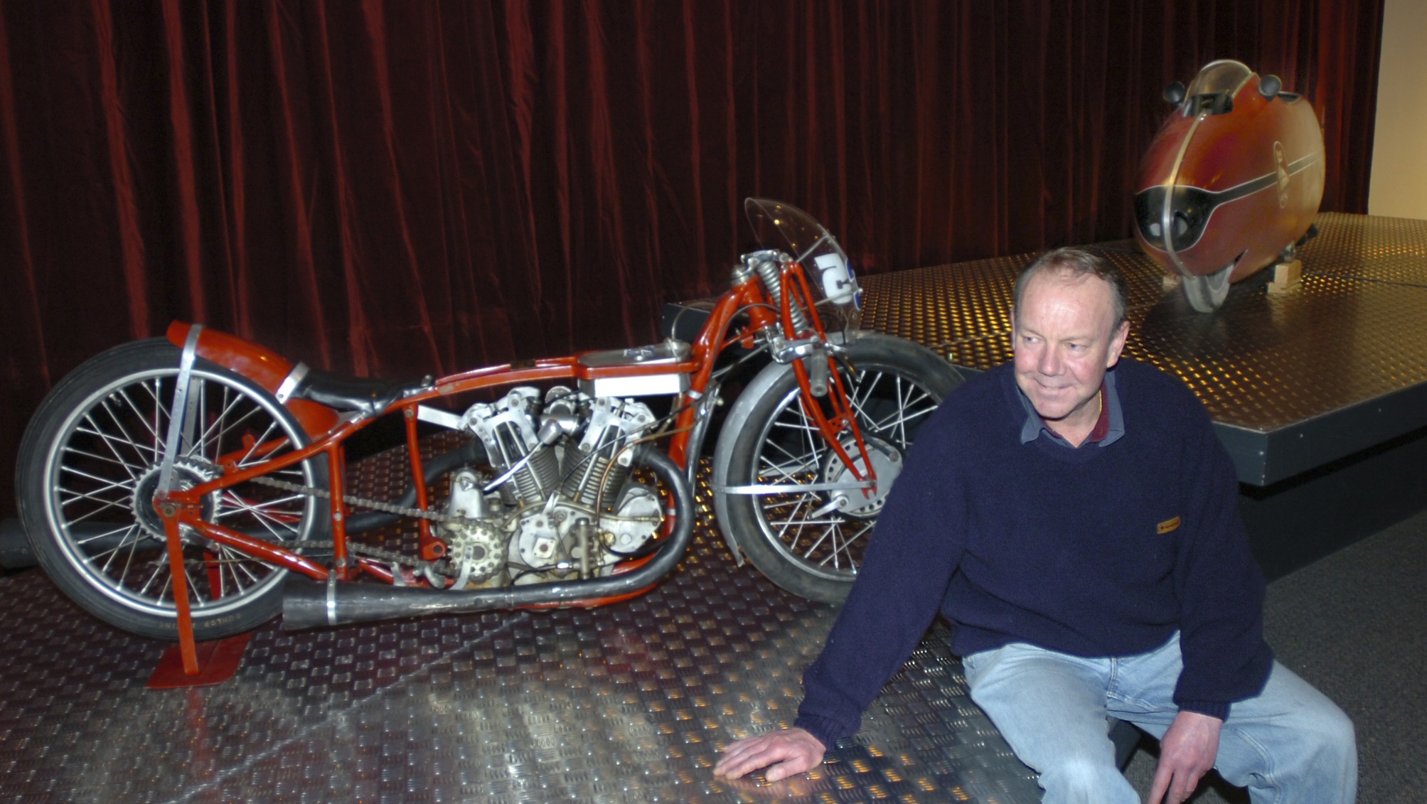 Bike enthusiast Neville Hayes with two mighty machines at an Otago Museum exhibition in 2006....