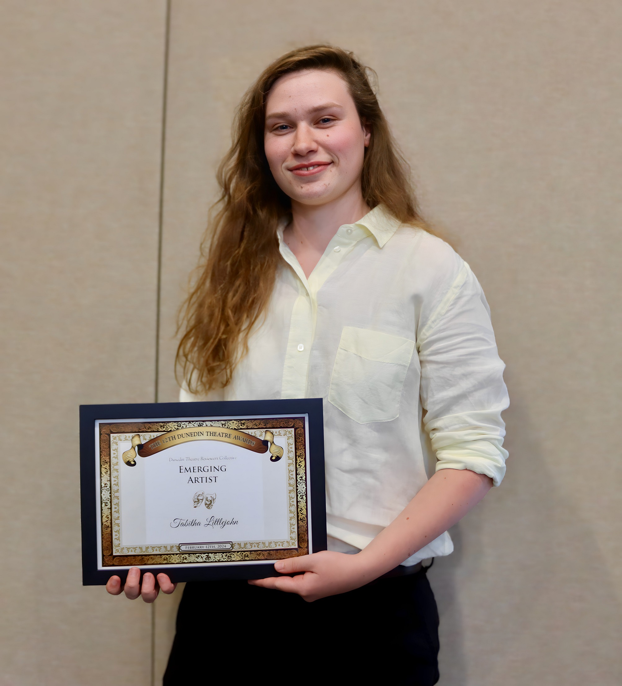 Recipient of the Emerging Artist awards Tabitha Littlejohn is pictured with her certificate.