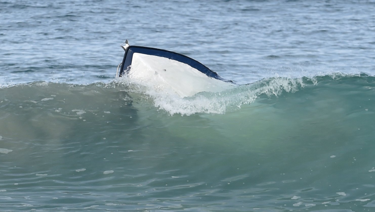 The capsized boat.