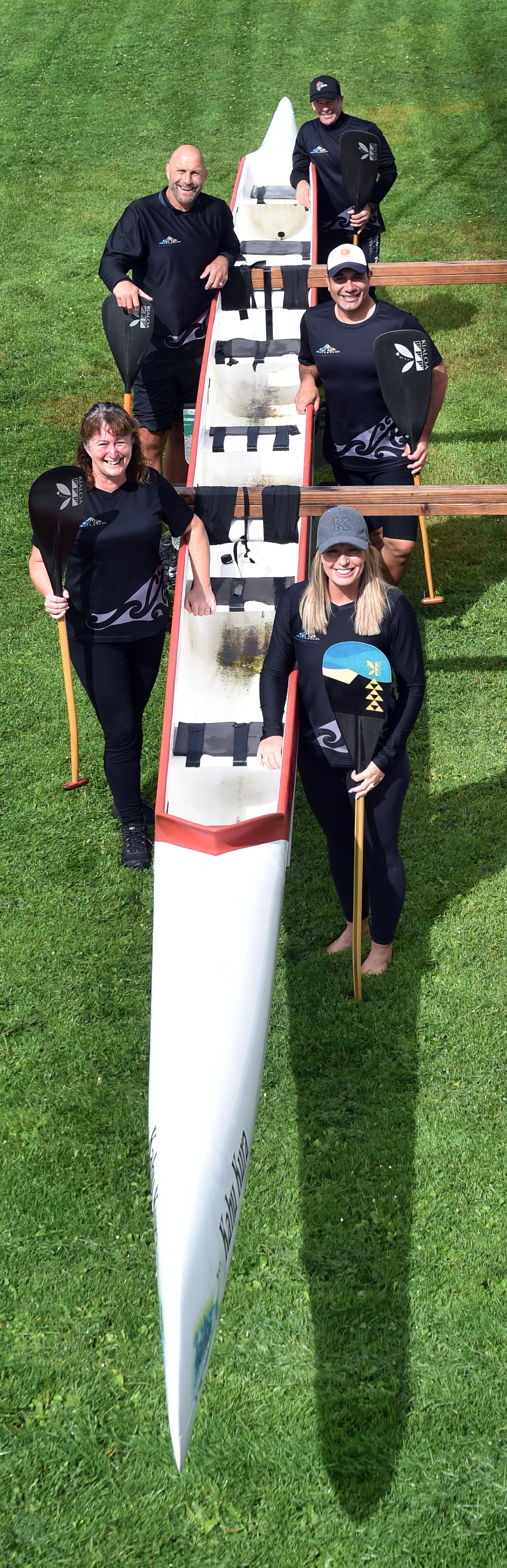 Triple Threat paddlers (clockwise from front left) Rochelle Cooper, Brendon Timmins, Ray Cooper,...