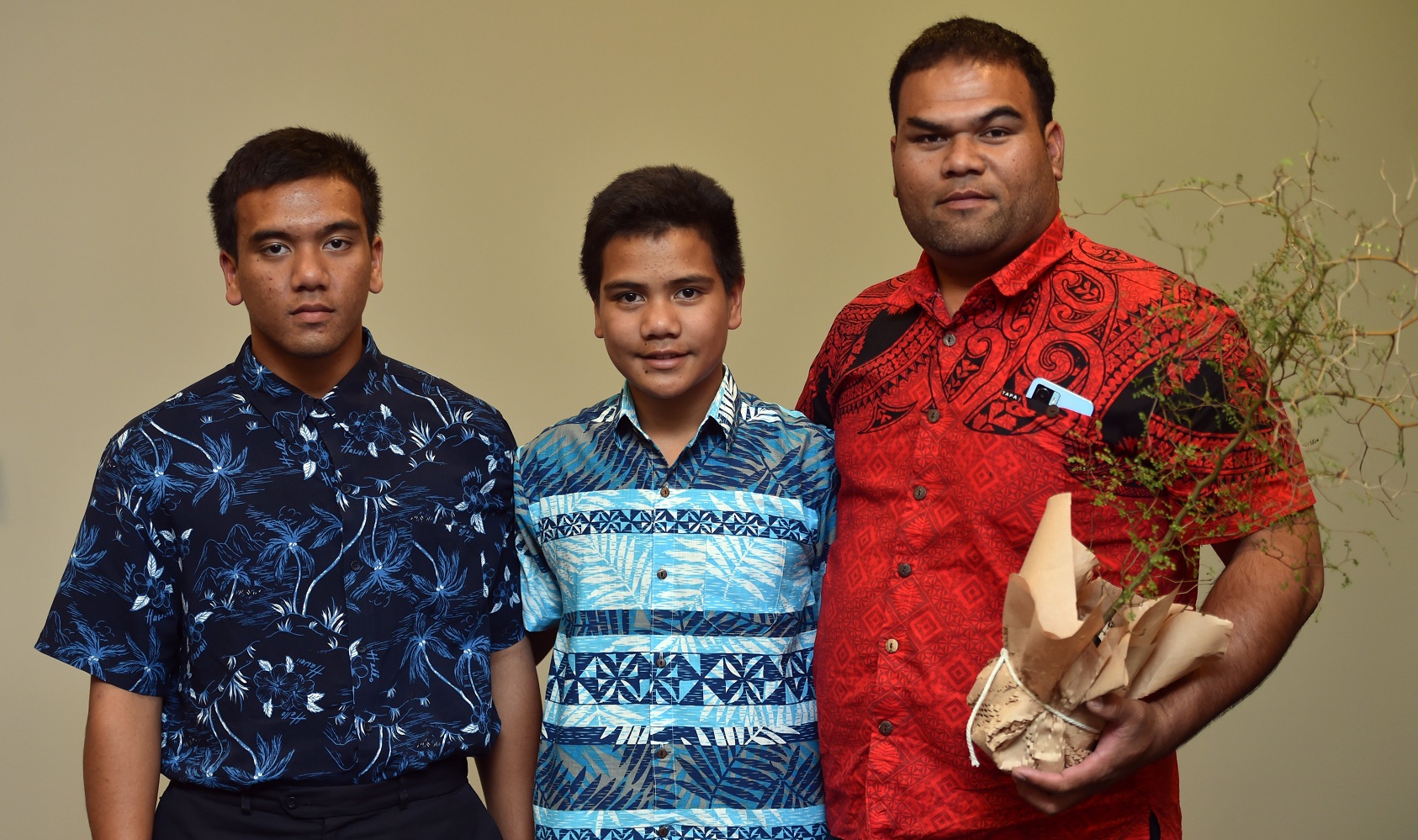 Celebrating at a citizenship ceremony at the Dunedin Town Hall yesterday are (from left) Martin...