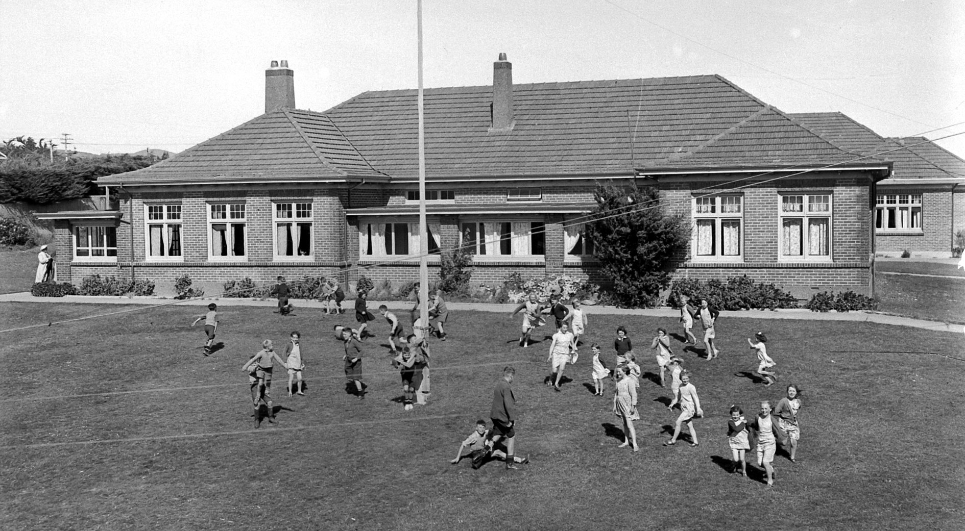 Children playing outside Glendining Presbyterian Children’s Home in1950. PHOTO: Evening Star