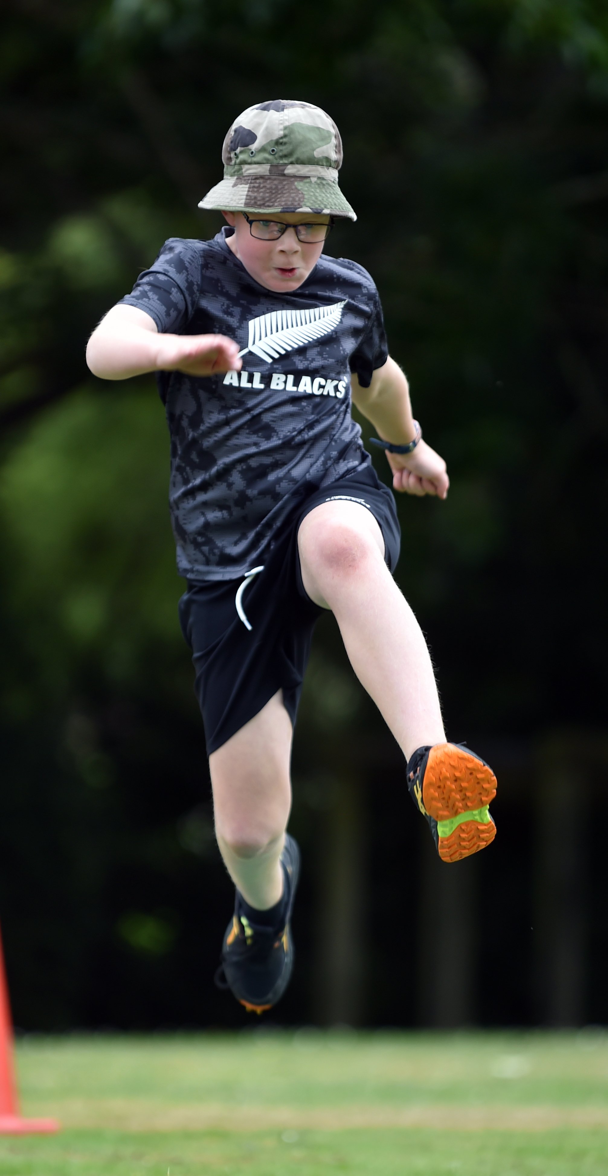 Cody Greene, 9, of Wakari Primary School, is airborne.