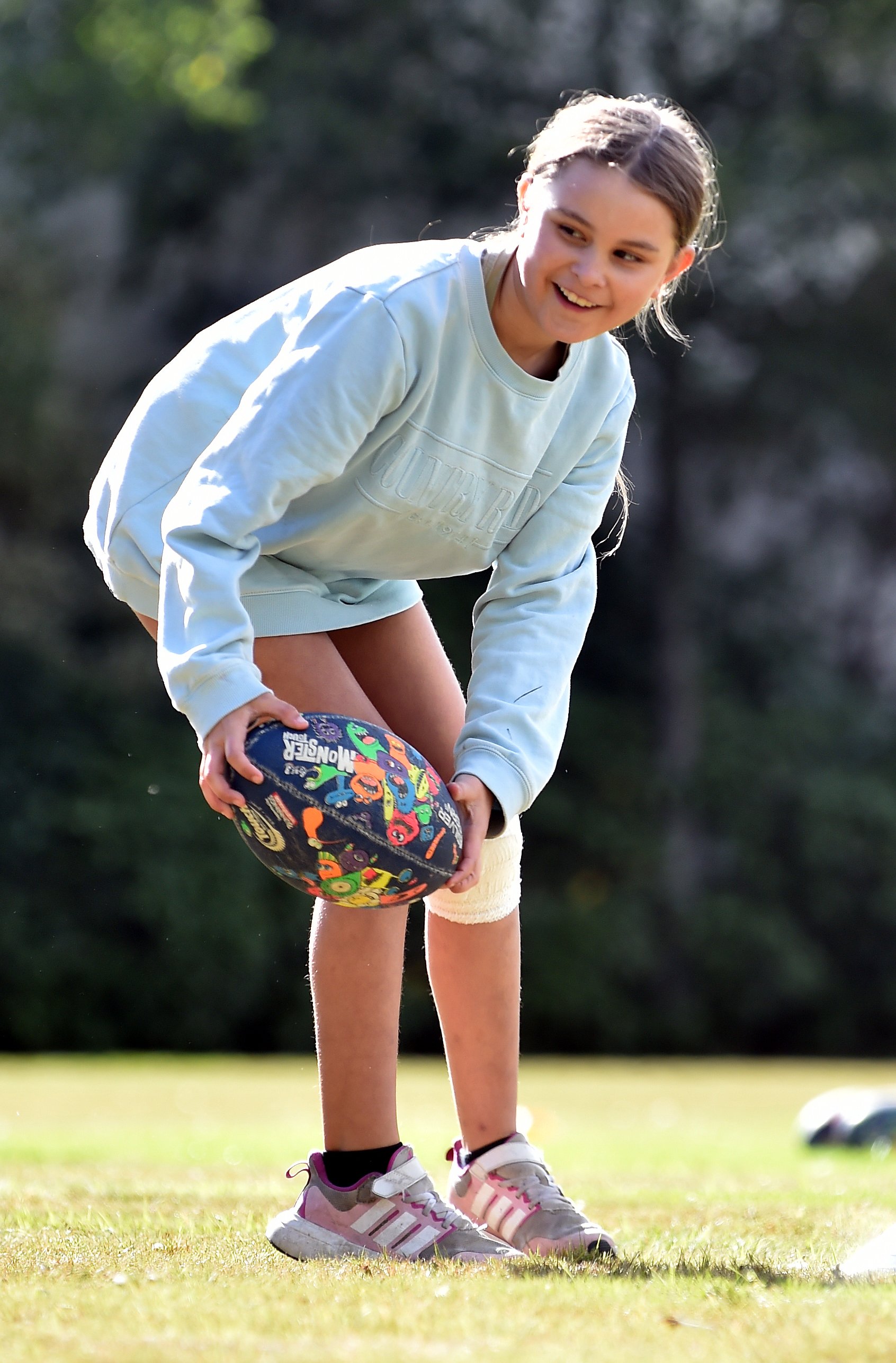 Avah Bishopp-Green, 9, of Wakari Primary School, prepares to pass a ball.