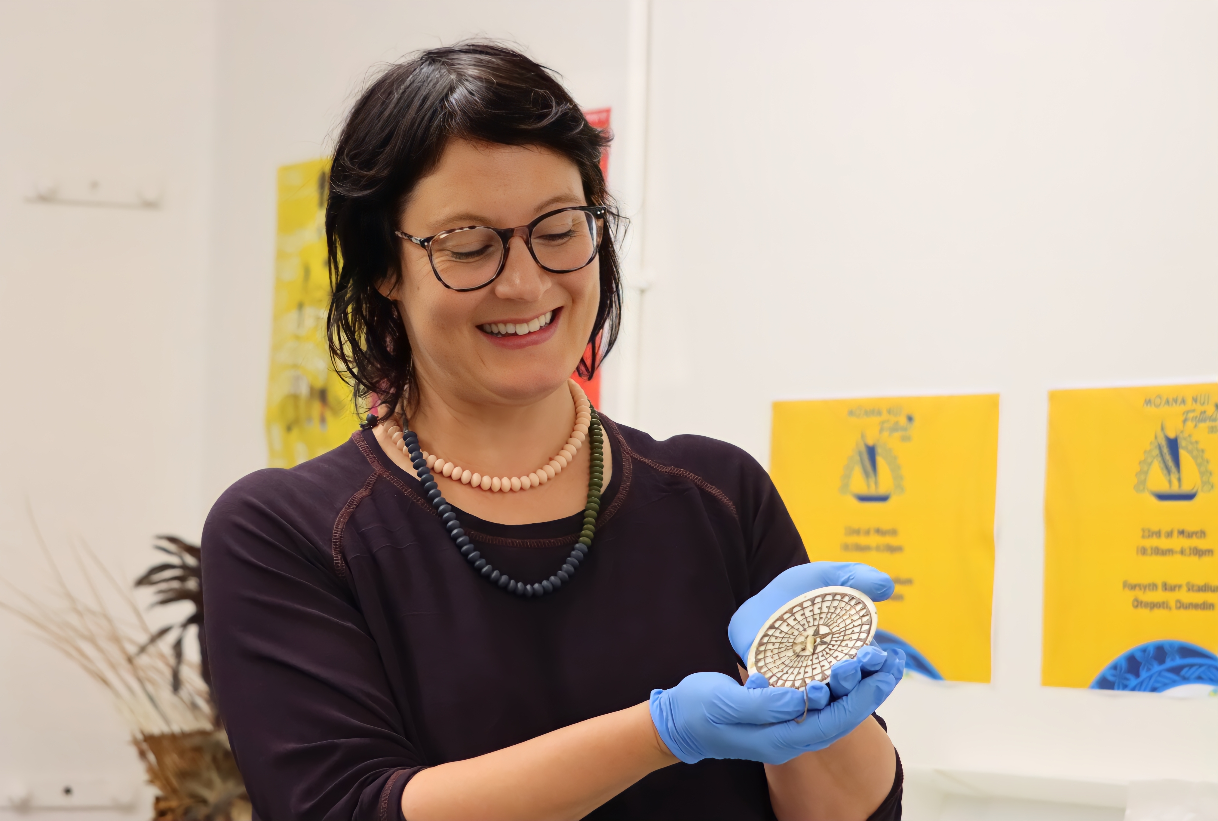 Decorative piece ... Tuhura Otago Museum collection manager, humanities Anne Harlow shows a...