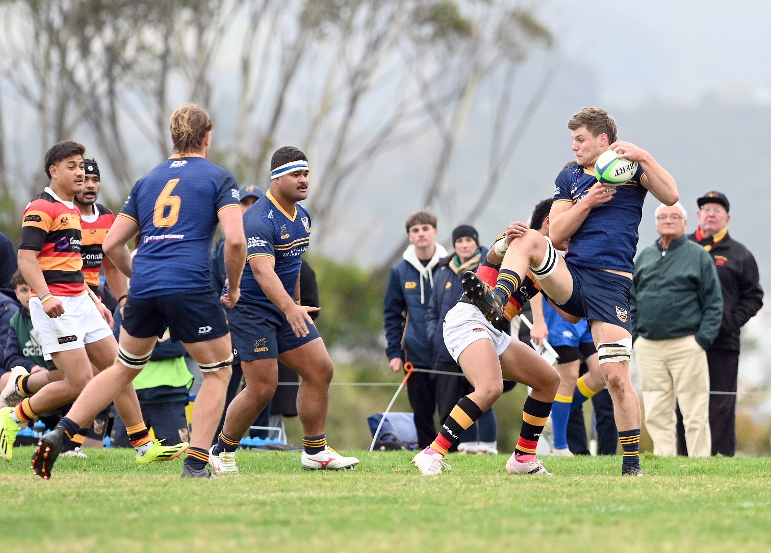 Dunedin's James Bolton holds the ball in today's premier rugby match against Zingari at...