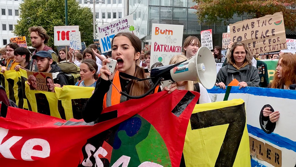 School Strike 4 Climate Co-Organiser Lucia Campbell-Reeves leads the march through central...