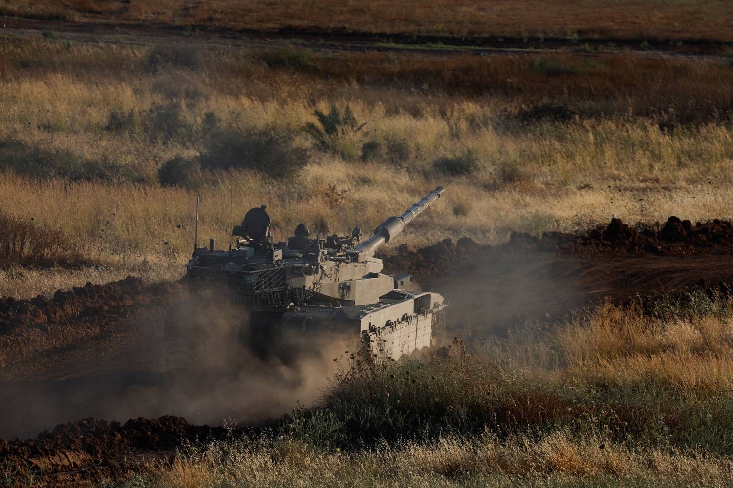 An Israeli tank manoeuvres near the Israel-Gaza border earlier this week. Photo: Reuters