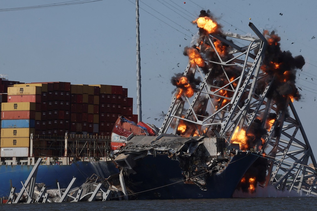 Explosives are detonated to free the container ship Dali after it was trapped following its crash...