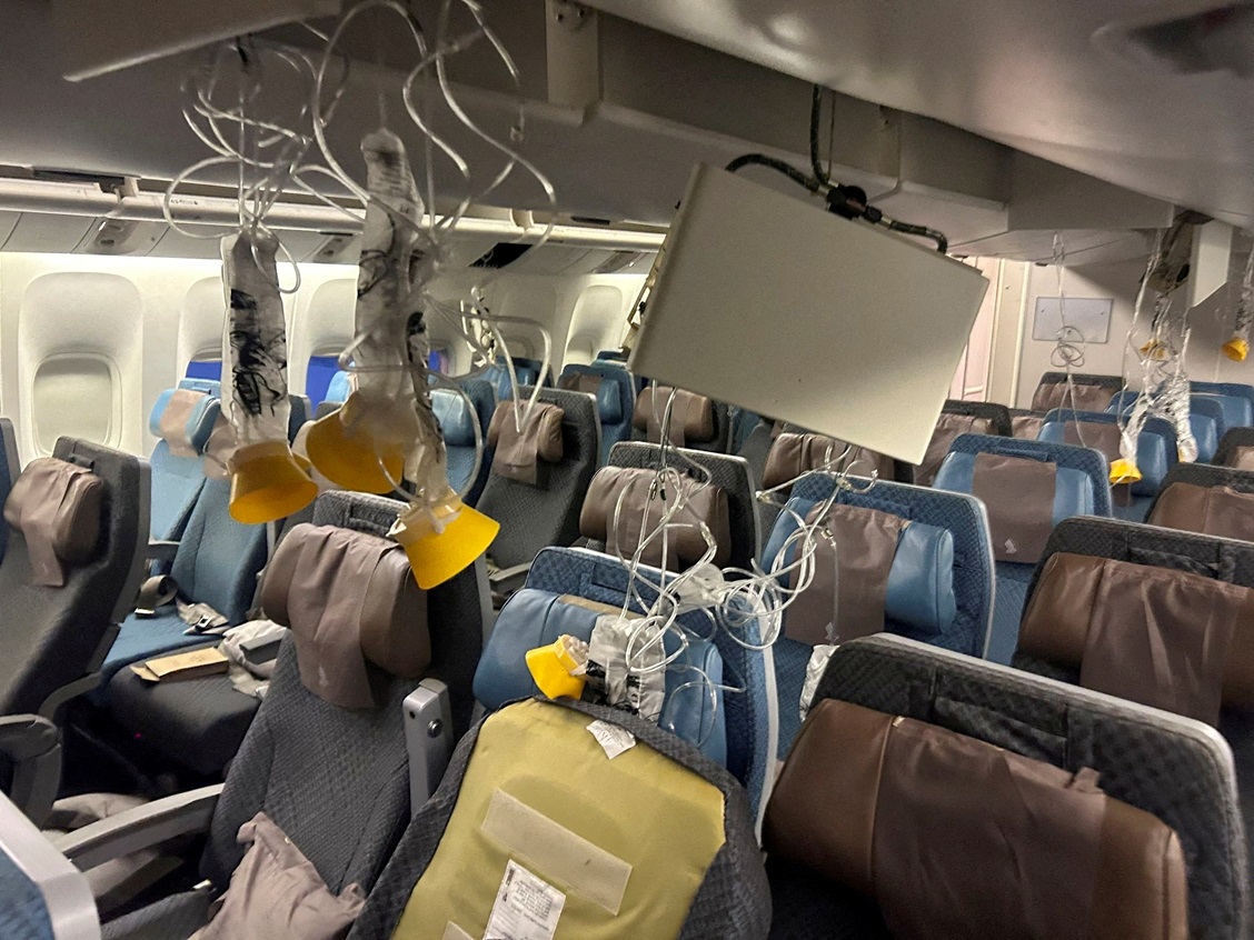 The interior of Singapore Airlines flight SQ321 is pictured after its emergency landing at...