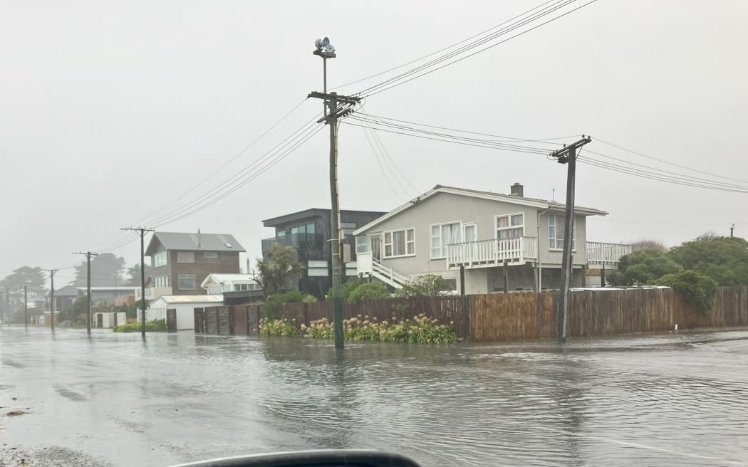 Heavy rain caused flooding in parts of New Brighton on Tuesday. Photo: Supplied / Kim Money