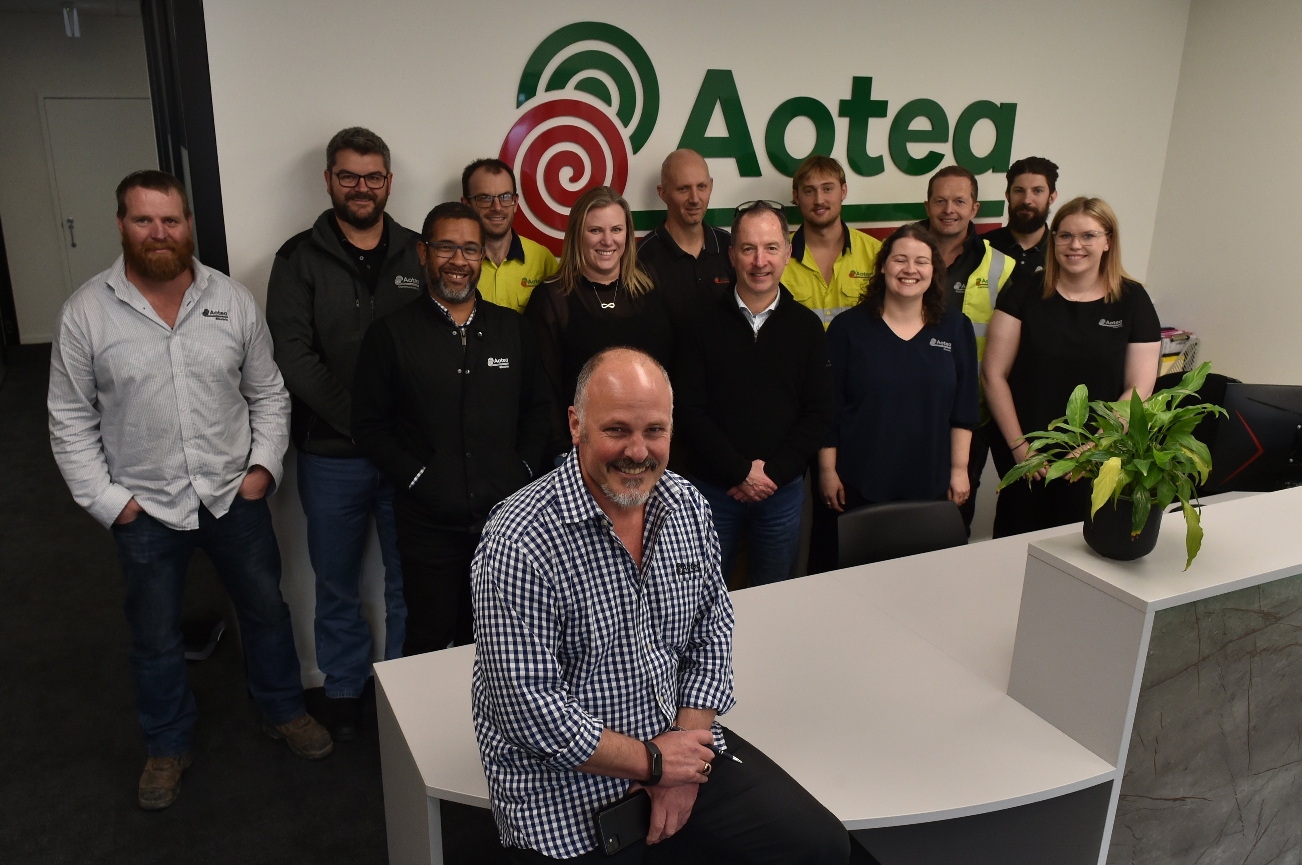 Aotea Electric Southern general manager Warren Taylor (front), with some of his team, says the...