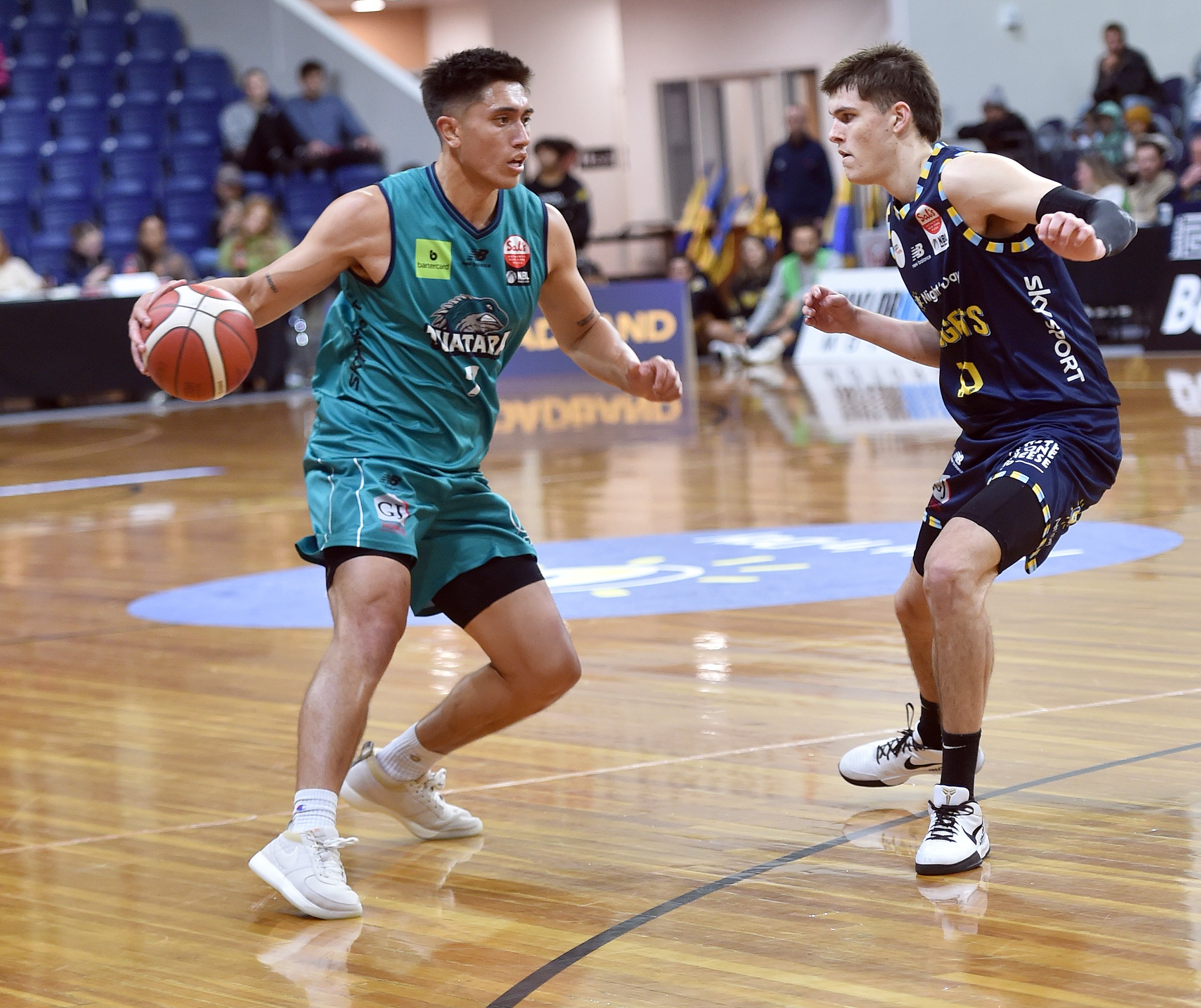 Nuggets' Ben Henshall (right) marks Tuatara player Reuben Te Rangi at the Edgar Centre tonight....