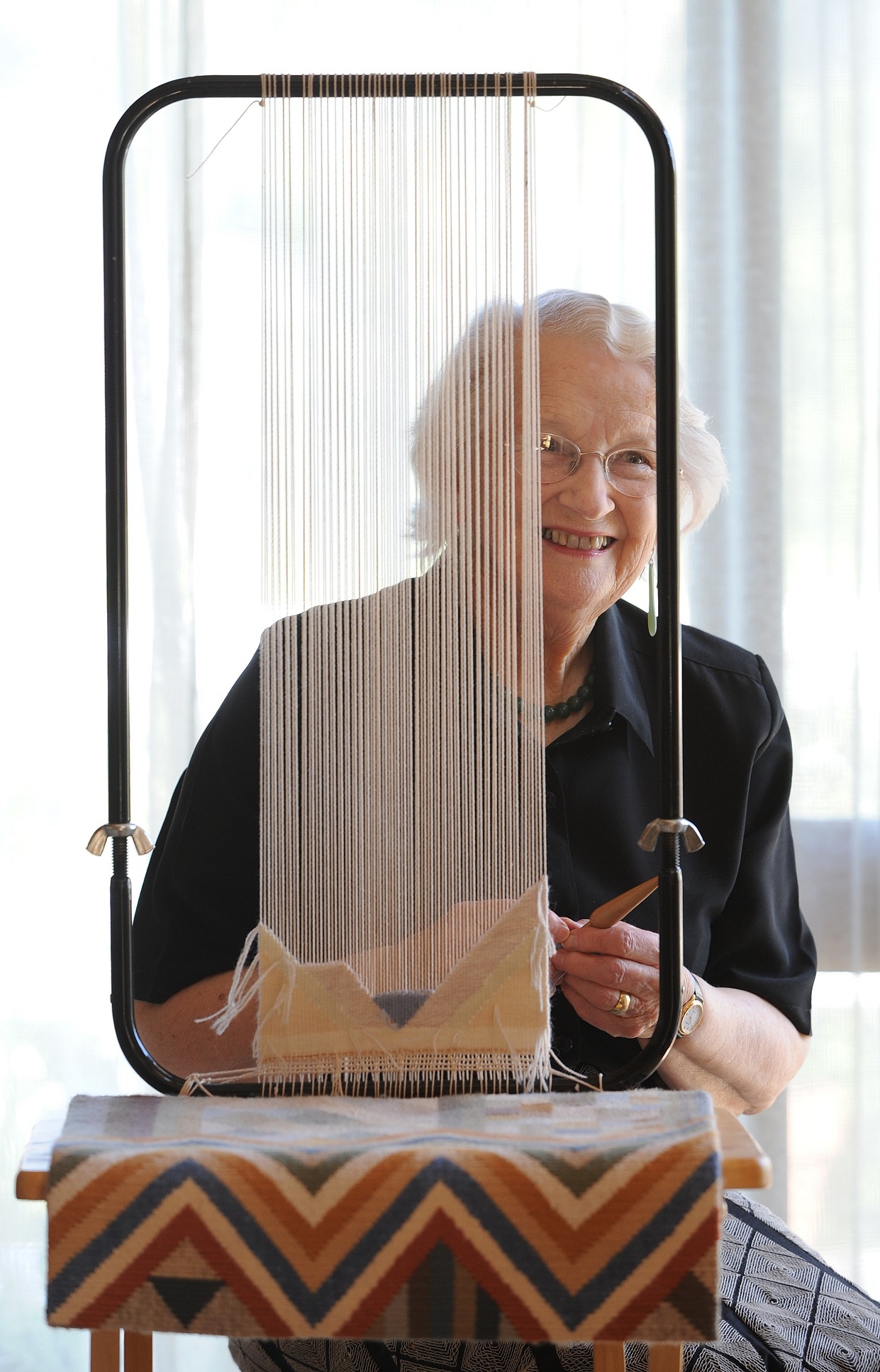 Margery Blackman at her tapestry loom in 2010 at the time of her exhibition at Brett McDowell...
