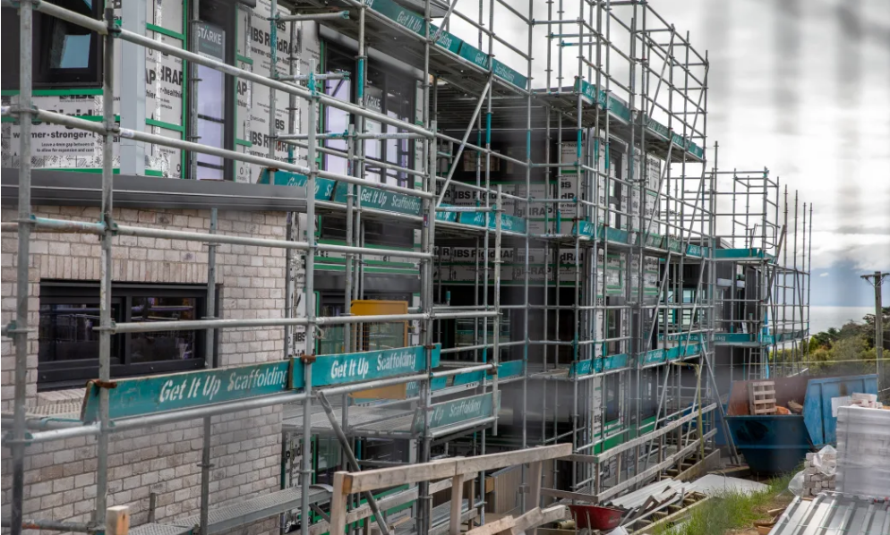 The homes have yet to be finished - currently, they're only clad on the outside. Photo: RNZ