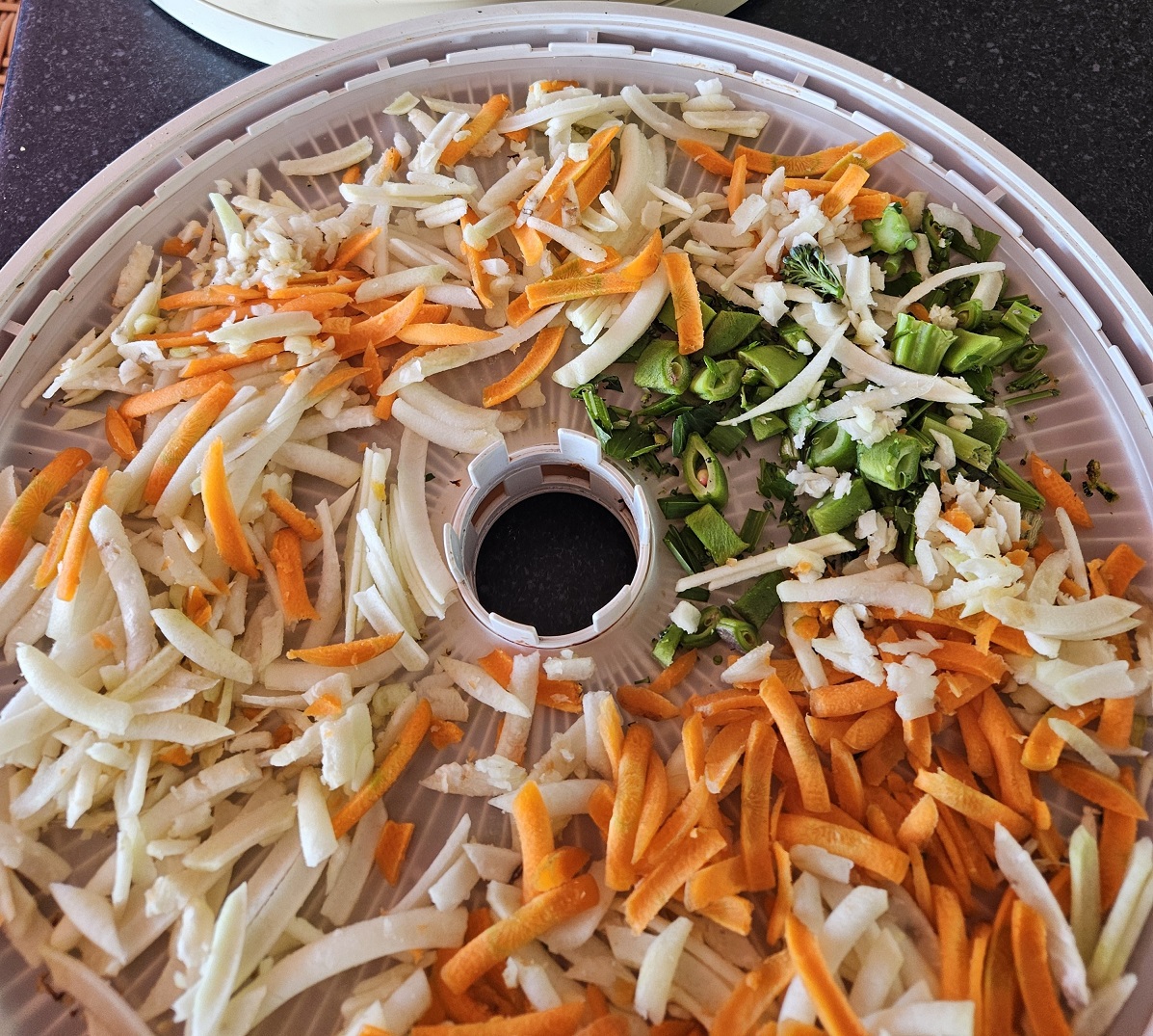 Chop the root vegetables and stalky bits and pieces finely so they dry faster.