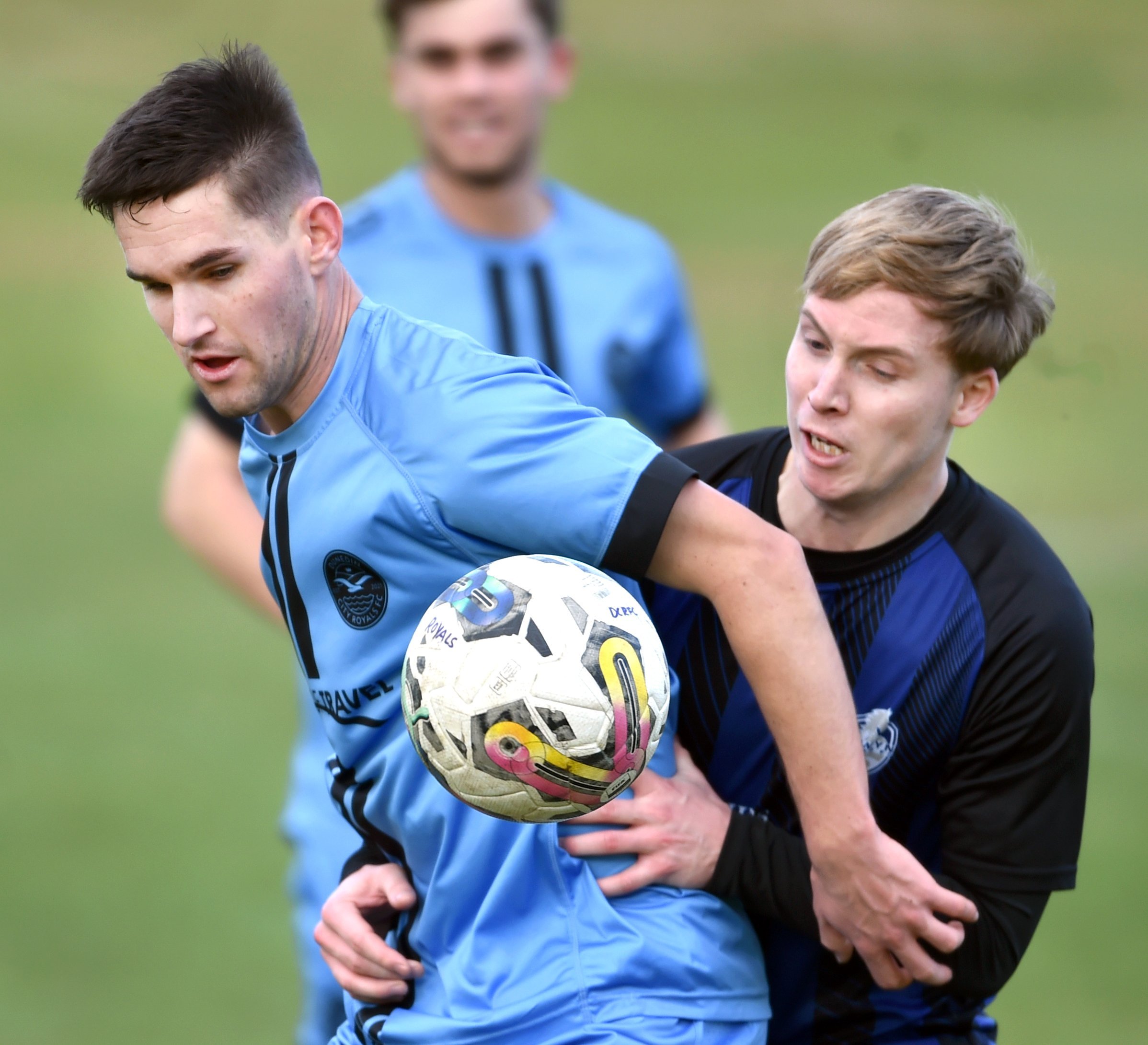 Dunedin City Royals player Raven August (left) contests for the ball against Selwyn United’s Luke...