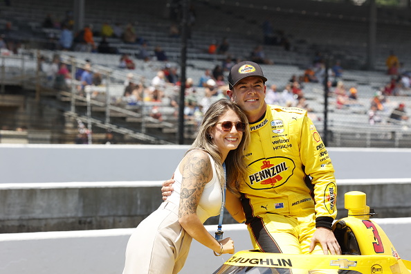 IndyCar driver Scott McLaughlin poses for a photo with his wife Karly. Photo: Getty Images