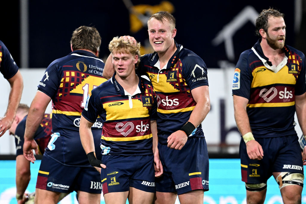 Highlanders Finn Hurley (L) and Sam Gilbert celebrate during their match against the Crusaders in...