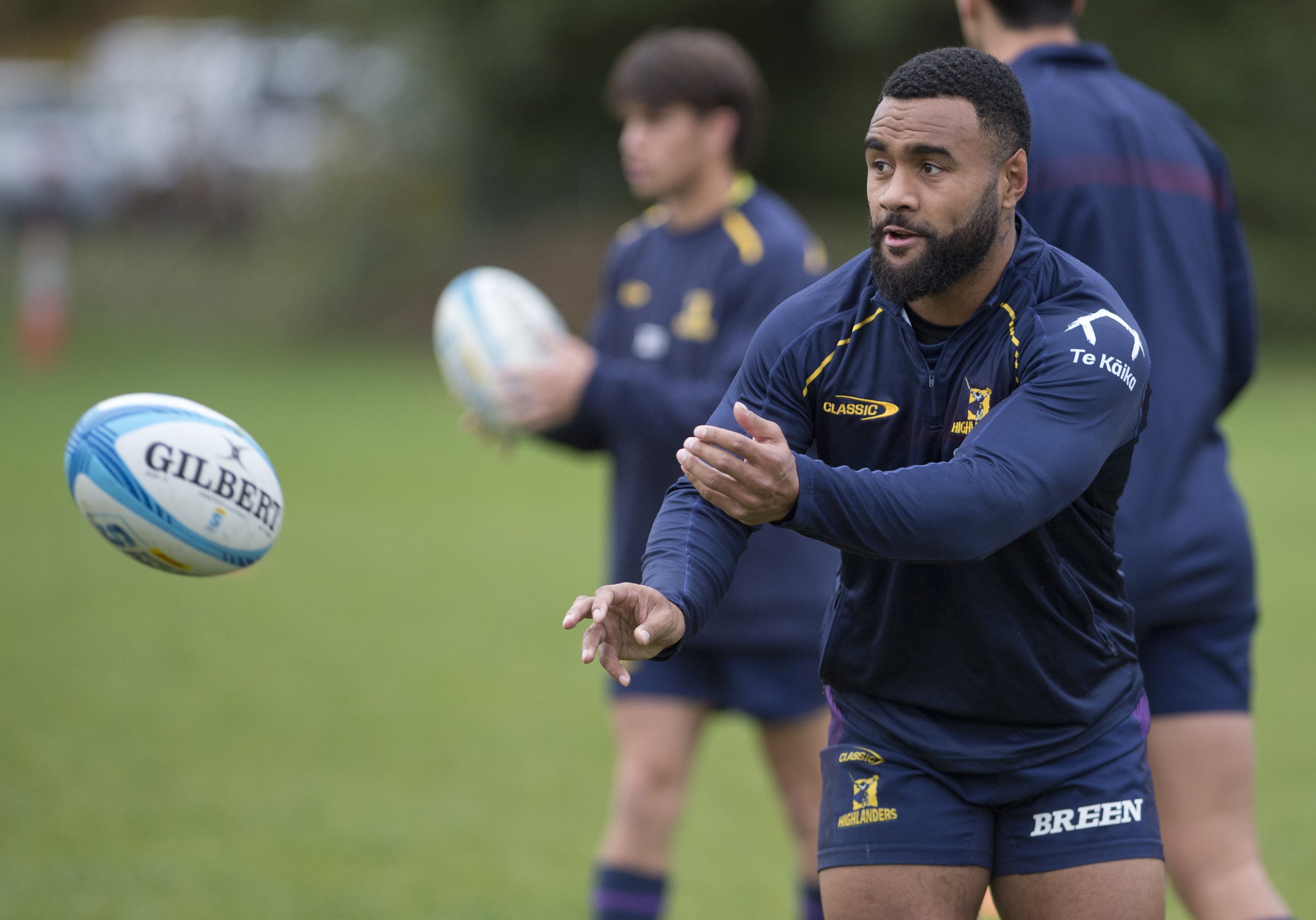 Highlanders winger Jona Nareki warms up during a training session at Forsyth Barr Stadium in...