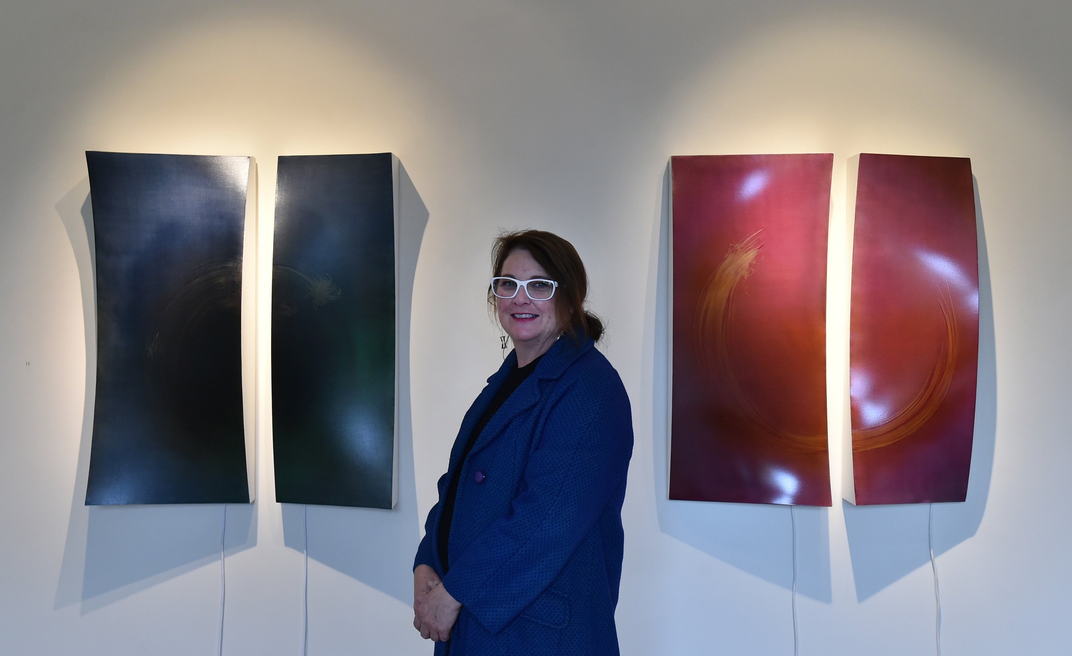 Larisse Hall enjoys seeing her works change as the light in a room changes such as (left) Hope...