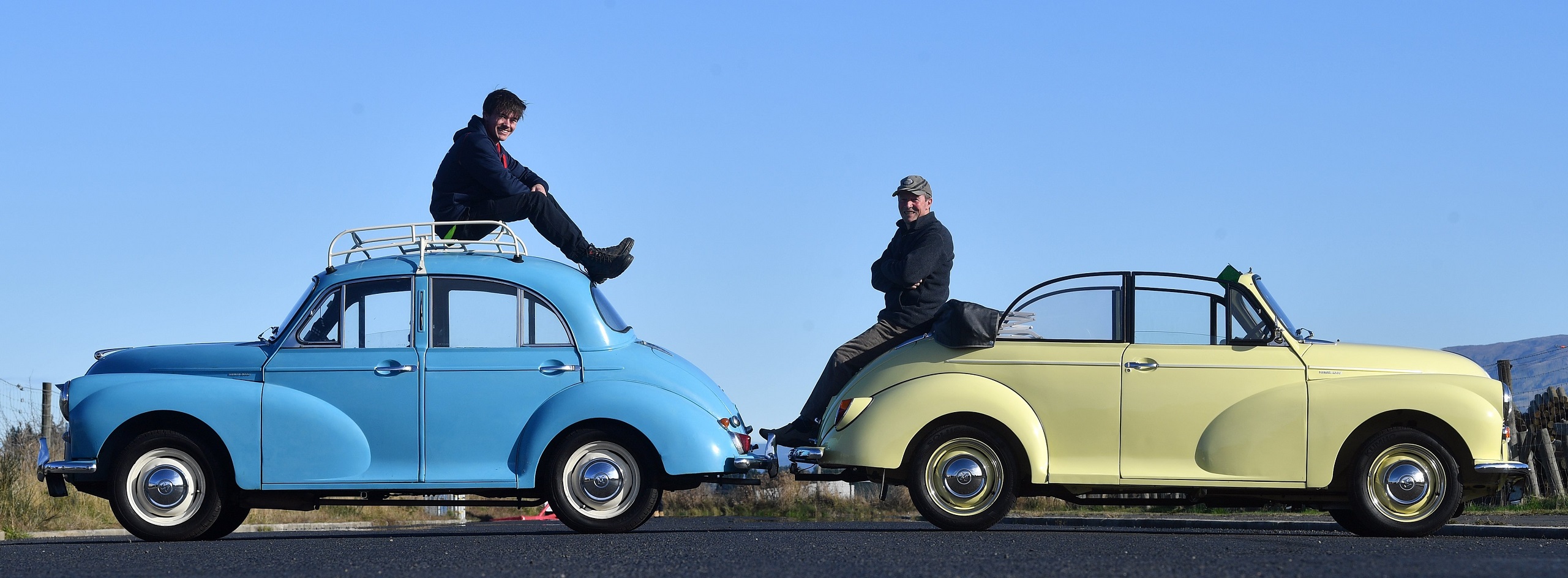 Devon Scott (left) with "Mavis", his 1961 Morris Minor 1000, and Garry Kerr with his 1958 Morris...